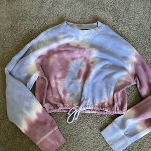 a cropped sweatshirt, with unjust able strings!